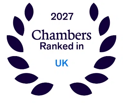 Award badge reading '2027 Chambers Ranked in UK' framed by a purple laurel wreath.
